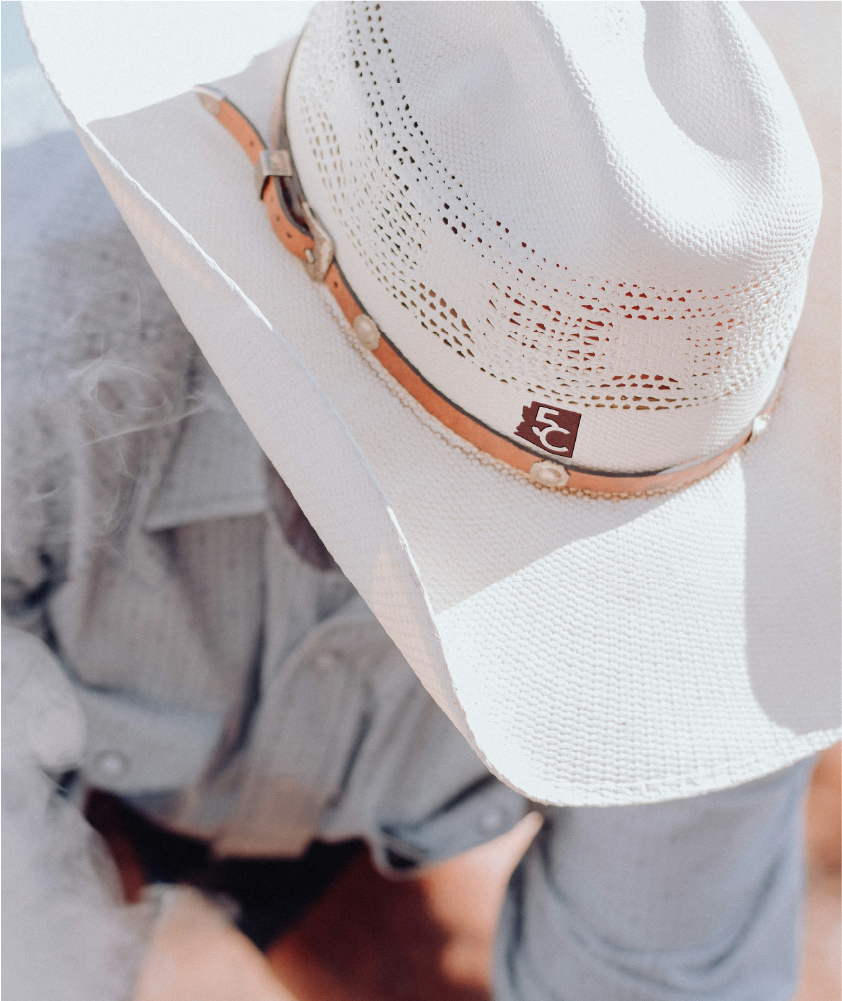 5C patch on a white cowboy hat.