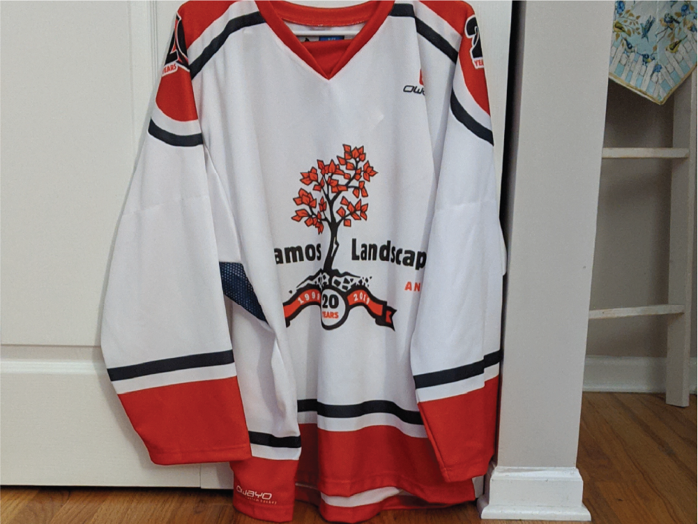 20th anniversary logos on a custom hockey jersey.